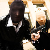 Armed robbers posing for a photo wearing masks