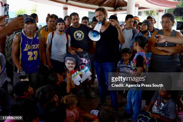 Demonstrators shout slogans against government policies of President of Venezuela Nicolas Maduro on October 22, 2023 in Tapachula, Mexico. On the day...