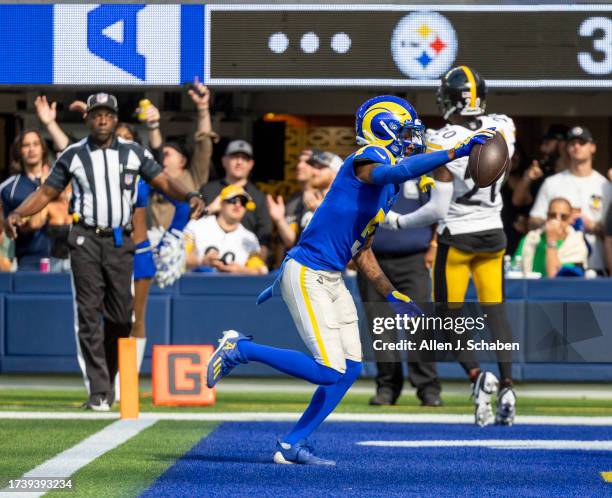 Inglewood, CA Rams wide receiver Tutu Atwell, runs a second quarter pass for a touchdown past Steelers cornerbacks Patrick Peterson, #20, at SoFi...