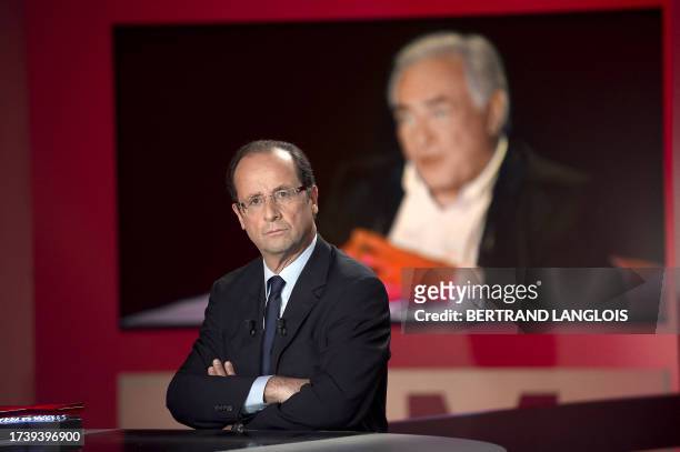 French deputy Francois Hollande, candidate for the Socialist primary elections before the 2012 France's presidential elections, takes part in the TV...