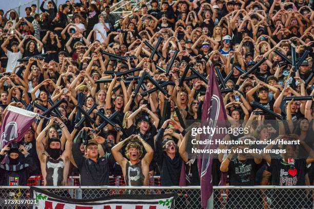 Pearland fans cheer on the Oilers In the first half of a high school football game against Dawson, Friday, Oct. 13, 2023 at The Rig in Pearland.