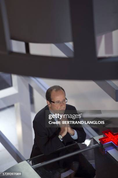 Francois Hollande, candidate for the French Socialist Party 2012 primary elections, takes part in the TV broadcast show "Dimanche +" on Canal Plus...