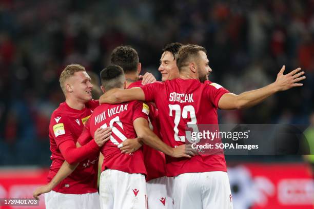 Players of Wisla Krakow celebrate after scoring a goal during Fortuna 1 Polish League 2023/2024 football match between Wisla Krakow and Resovia...