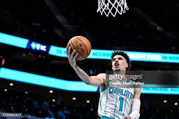 LaMelo Ball of the Charlotte Hornets drives to the basket for a layup against the Oklahoma City Thunder during the first half of his game at Spectrum...