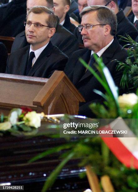 Polish President Bronis?aw Komorowski attends on October 28, 2010 the funeral of Marek Rosiak, an aide to a European parliamentarian of the...