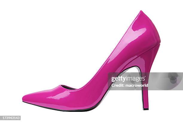 pink, patent, high-heeled shoe on a white background - pump schoen stockfoto's en -beelden