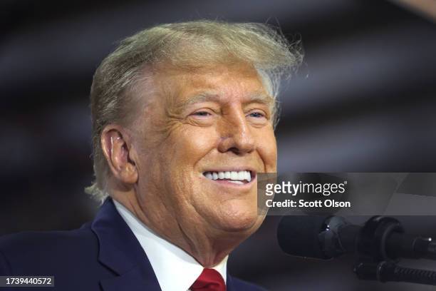 Republican presidential candidate former President Donald Trump speaks to guests during a campaign event at the Dallas County Fairgrounds on October...