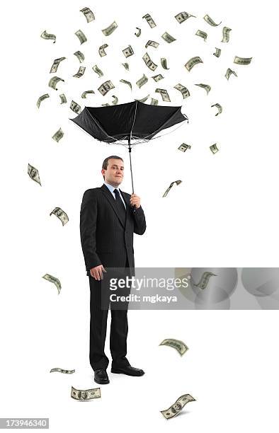 businessman under the money rain - debt collector stockfoto's en -beelden