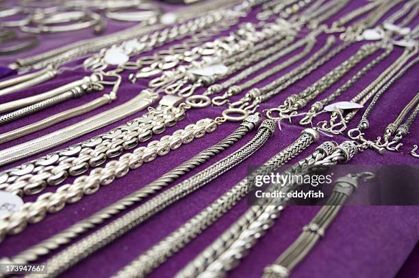 bracelets, chains & necklaces - silver bracelet stock pictures, royalty-free photos & images