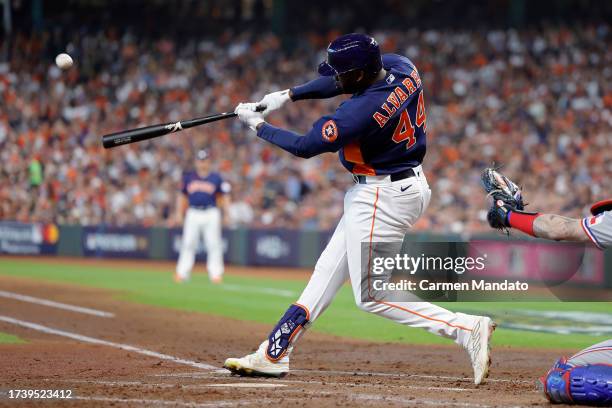 Yordan Alvarez of the Houston Astros hits a solo home run against Nathan Eovaldi of the Texas Rangers during the second inning in Game Two of the...