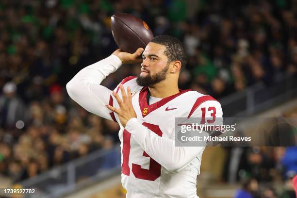 Caleb Williams of the USC Trojans warms up against the Notre Dame Fighting Irish during the first half at Notre Dame Stadium on October 14, 2023 in...