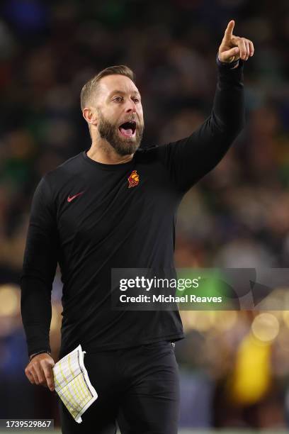 Senior Offensive Analyst Kliff Kingsbury of the USC Trojans reacts against the Notre Dame Fighting Irish at Notre Dame Stadium on October 14, 2023 in...