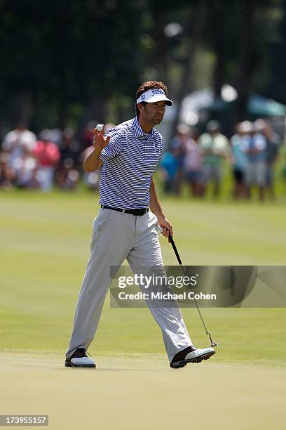 Michael Letzig holds up his ball during the third round of the John Deere Classic held at TPC Deere Run on July 13, 2013 in Silvis, Illinois.