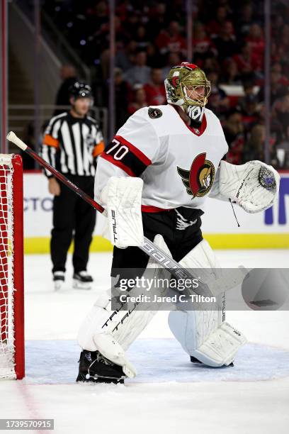 Joonas Korpisalo of the Ottawa Senators protects the net during the second period of their game against the Carolina Hurricanes at PNC Arena on...