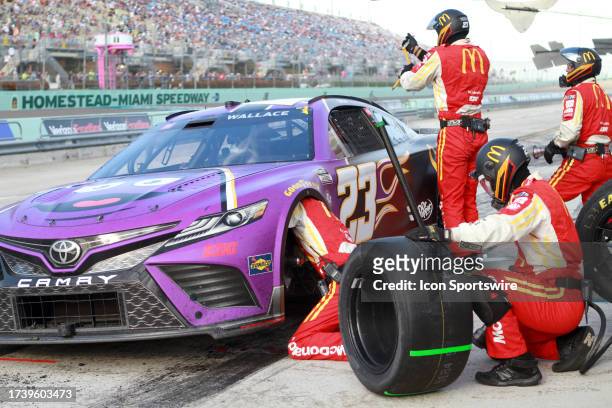 Bubba Wallace pit crew makes repairs during the NASCAR Cup Series Playoff 4EVER 400 on October 22 at Homestead-Miami Speedway in Homestead, FL.