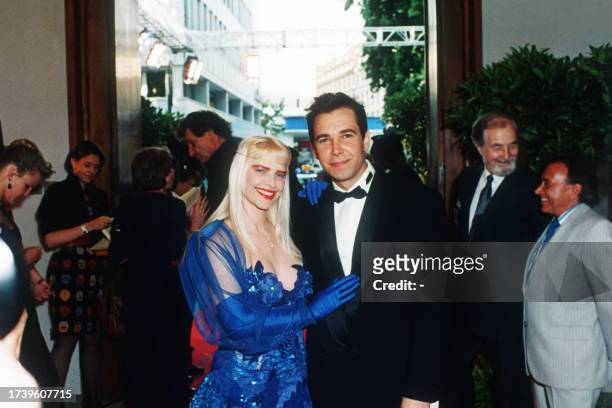Italian porno-star, Parliamentary Deputy Ilona "Cicciolina" Staller arrives with her husband, American sculptor Jeff Koons, for a benefit dinner of...