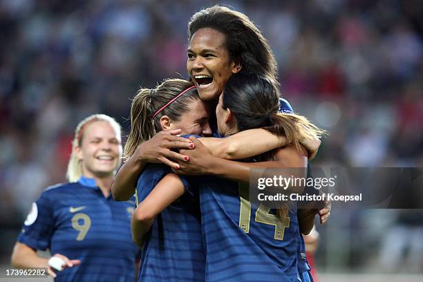Wendine Renard of France celebrates the third goal with Camille Abily anc Louisa Necib of France during the UEFA Women's EURO 2013 Group C match...