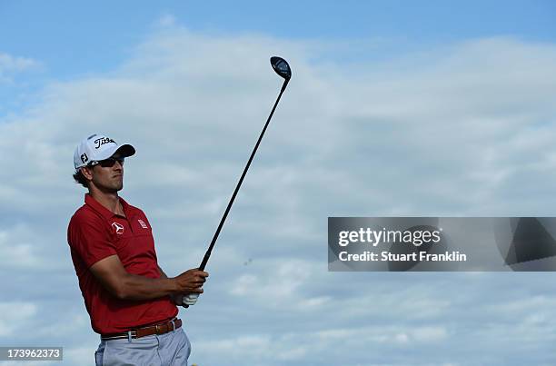 Adam Scott of Australia tees off during the first round of the 142nd Open Championship at Muirfield on July 18, 2013 in Gullane, Scotland.