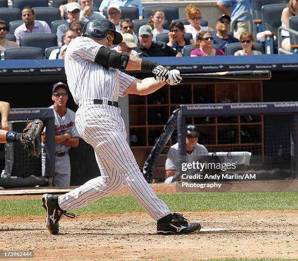 Travis Hafner of the New York Yankees bats against the Minnesota Twins at Yankee Stadium on July 14, 2013 in the Bronx borough of New York City.