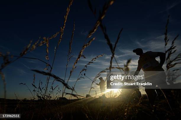 Scott Brown of the United States tees off on the 18th hole during the first round of the 142nd Open Championship at Muirfield on July 18, 2013 in...