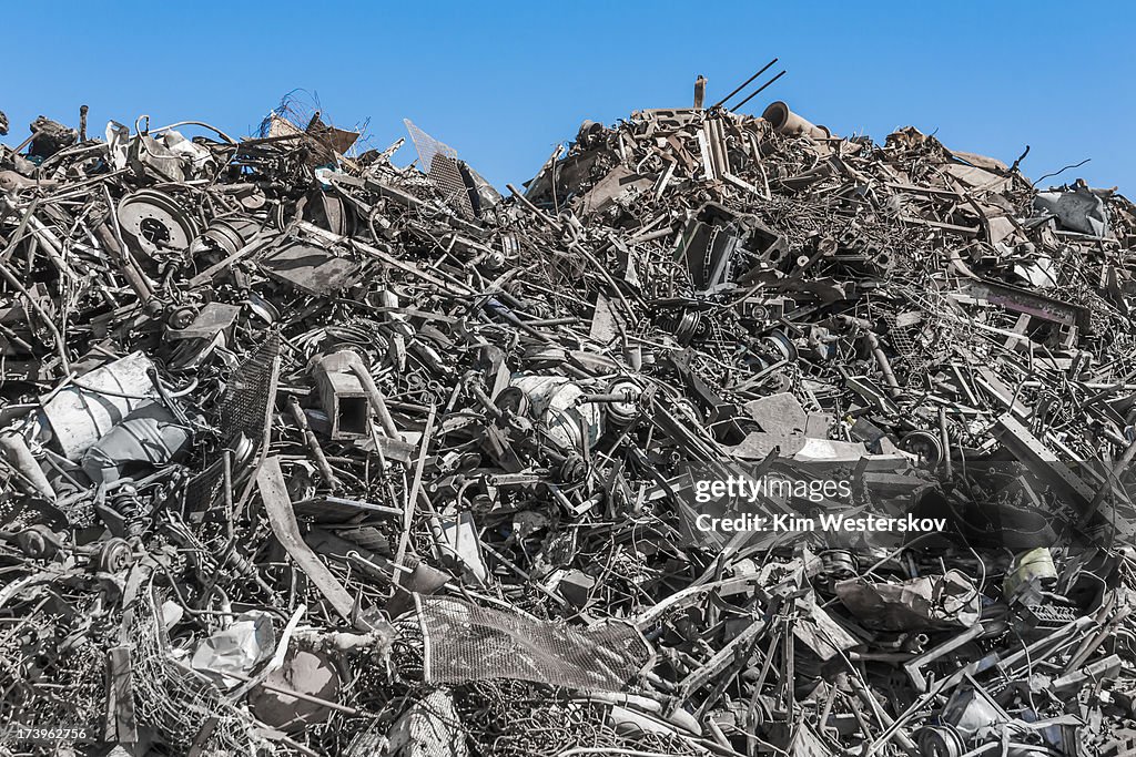 Large scrap metal heap in recycling yard