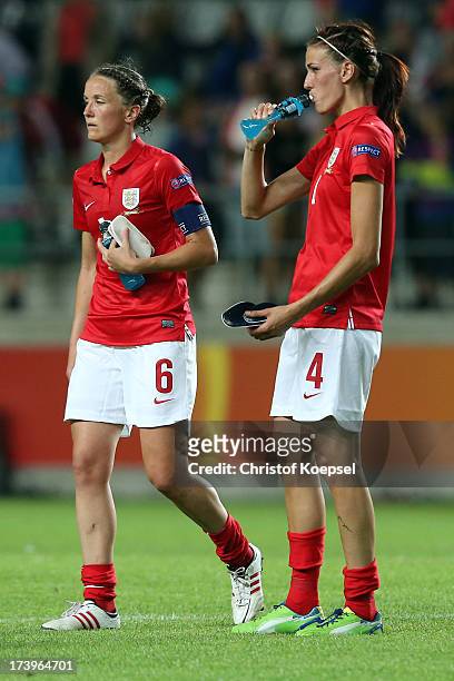 Casey Stoney and Jill Scott of England look dejected after the UEFA Women's EURO 2013 Group C match between France and England at Linkoping Arena on...
