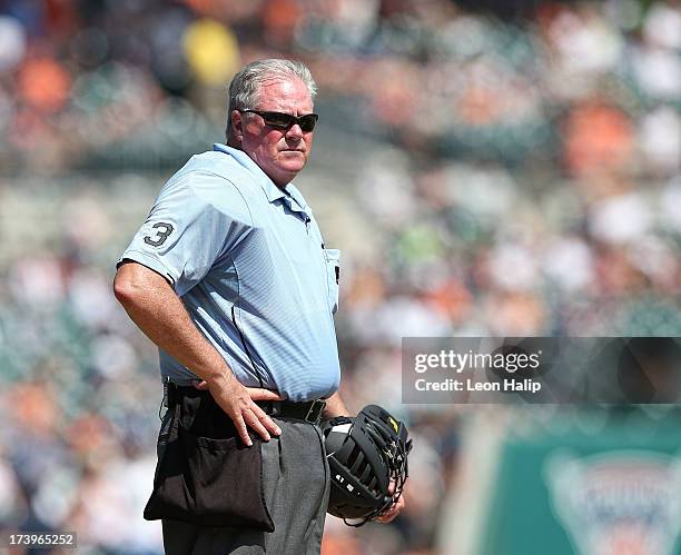 Major League Umpire Tim Welke watches the action during the game between the Texas Rangers and the Detroit Tigers at Comerica Park on July 14, 2013...