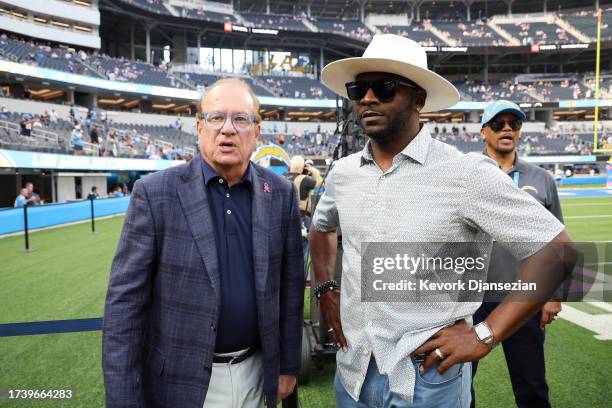 Los Angeles Chargers owner Dean Spanos stands with former Chargers running back LaDainian Tomlinson before the game against the Dallas Cowboys at...