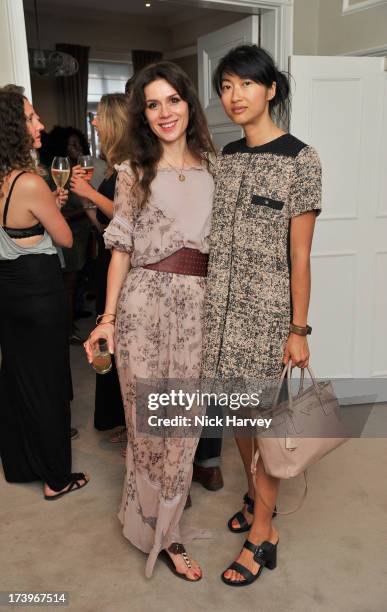 Lara Bohinc and Mimi Xu attend MATCHESFASHION.COM Partners With Rika On 'Iron Girl' Project For Rika Magazine on July 18, 2013 in London, England.