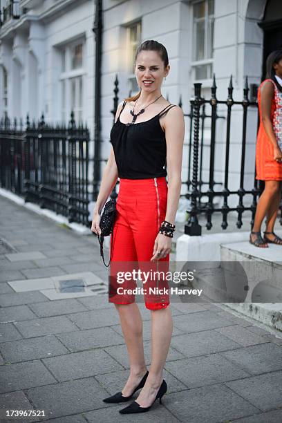 Amy Bailey attends MATCHESFASHION.COM Partners With Rika On 'Iron Girl' Project For Rika Magazine on July 18, 2013 in London, England.