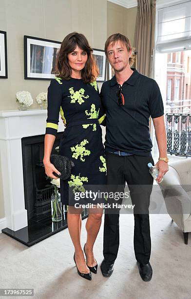 Helena Christensen and Paul Banks attend MATCHESFASHION.COM Partners With Rika On 'Iron Girl' Project For Rika Magazine on July 18, 2013 in London,...