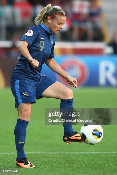 Eugenie Le Sommer of France runs with the ball during the UEFA Women's EURO 2013 Group C match between France and England at Linkoping Arena on July...