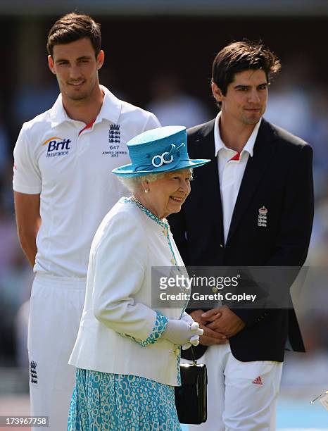 Queen Elizabeth II smiles after meeting England captain Alastair Cook and Steven Finn prior to day one of the 2nd Investec Ashes Test match between...