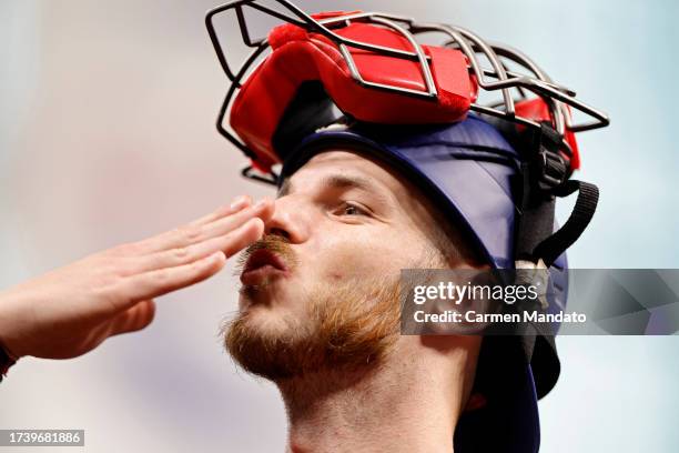 Jonah Heim of the Texas Rangers celebrates after defeating the Houston Astros in Game Two of the American League Championship Series at Minute Maid...