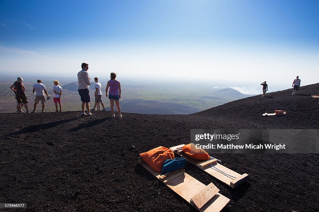 Hikiers climb Cerro Negro for Volcano Boarding