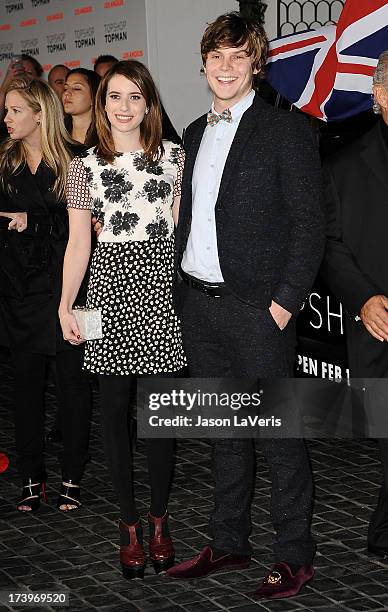 Actress Emma Roberts and actor Evan Peters attend the Topshop Topman LA flagship store opening party at Cecconi's Restaurant on February 13, 2013 in...