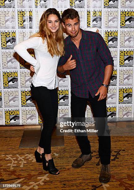Actress Shailene Woodley and actor Theo James attend the "Ender's Game" and "Divergent" press line during Comic-Con International 2013 at the Hilton...
