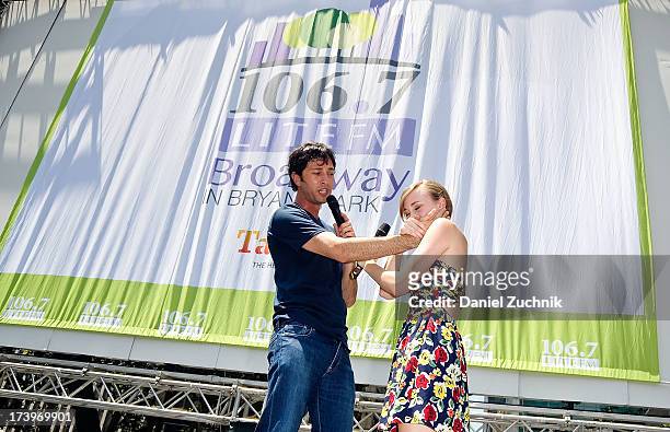 Kyle Barisich and Samantha Hill from "Phantom of the Opera" perform during 106.7 LITE FM's Broadway in Bryant Park 2013 at Bryant Park on July 18,...