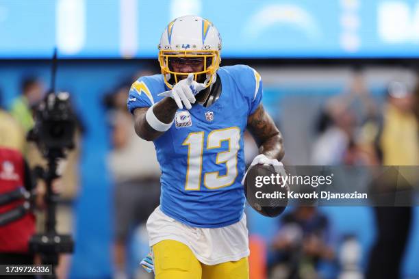 Keenan Allen of the Los Angeles Chargers celebrates after scoring a touchdown during the first quarter against the Dallas Cowboys at SoFi Stadium on...