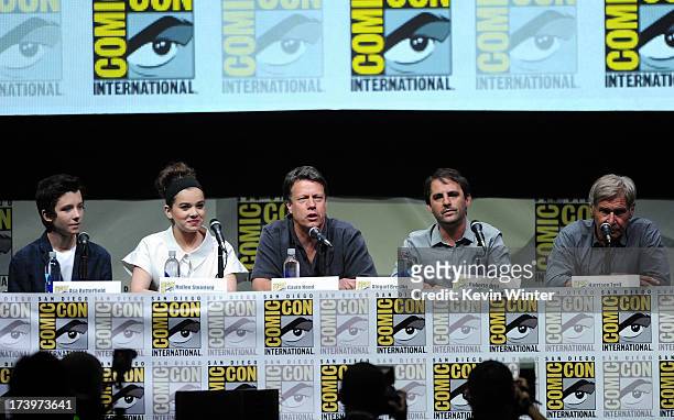 Actors Asa Butterfield, Hailee Steinfeld, writer/director Gavin Hood, producer Roberto Orci, and actor Harrison Ford speak onstage at the "Enders...