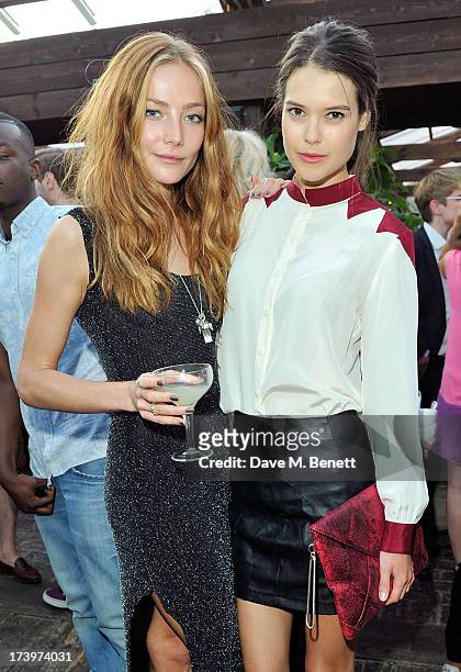 Clara Paget and Sarah Ann Macklin attends Warner music group summer party in association with Esquire at Shoreditch House on July 18, 2013 in London,...
