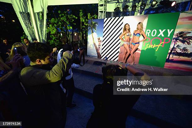 Models pose at the Mercedes-Benz Fashion Week Swim 2014 Official Kick Off Party at the Raleigh Hotel on July 18, 2013 in Miami Beach, Florida.