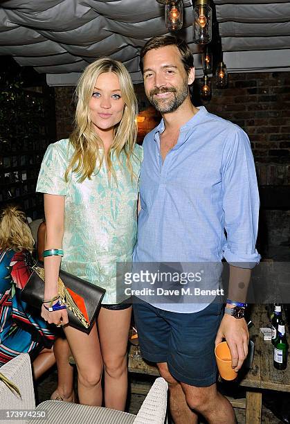 Laura Whitmore and Patrick Grant attends Warner music group summer party in association with Esquire at Shoreditch House on July 18, 2013 in London,...