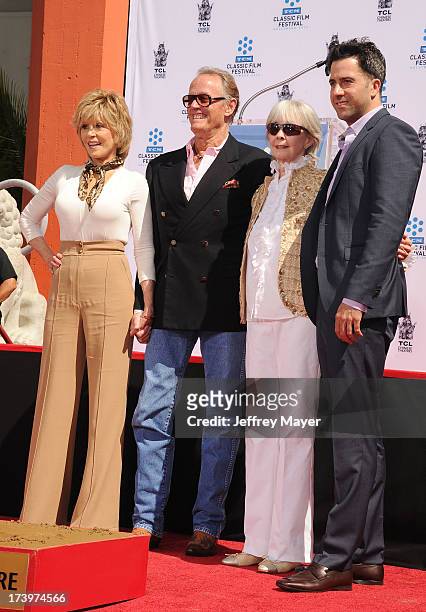 Actors Jane Fonda, Peter Fonda, Shirlee Mae Adams and Troy Garity attend actress Jane Fonda's Handprint/Footprint Ceremony during the 2013 TCM...