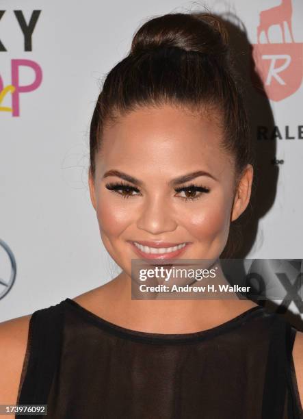 Model Chrissy Teigen attends the Mercedes-Benz Fashion Week Swim 2014 Official Kick Off Party at the Raleigh Hotel on July 18, 2013 in Miami Beach,...