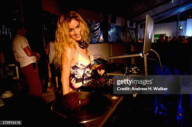 Chelsea Leyland spins at the Mercedes-Benz Fashion Week Swim 2014 Official Kick Off Party at the Raleigh Hotel on July 18, 2013 in Miami Beach,...