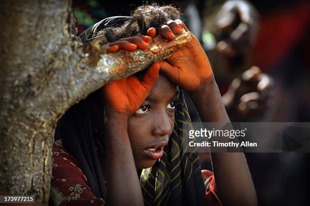 wodaabe tribe young boy watching dance - gerewol courtship ritual competition stock pictures, royalty-free photos & images