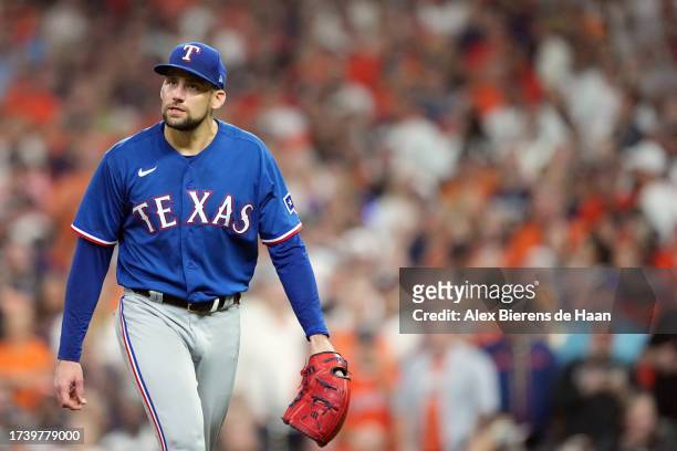 Nathan Eovaldi of the Texas Rangers walks back to the dugout during Game 6 of the ALCS between the Texas Rangers and the Houston Astros at Minute...
