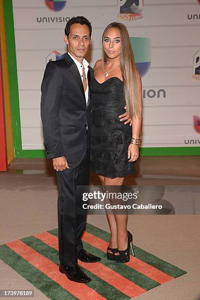 Singer Marc Anthony and Chloe Green attend the Premios Juventud 2013 at Bank United Center on July 18, 2013 in Miami, Florida.