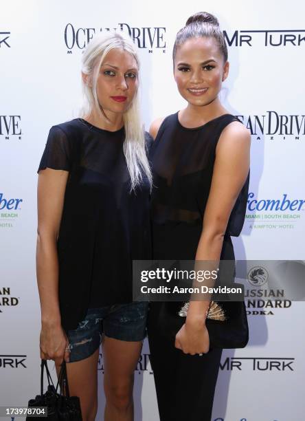 Designer Katie Gallagher and model Chrissy Teigen attend the Ocean Drive Magazine Issue Release Party hosted by cover model Hannah Davis during...